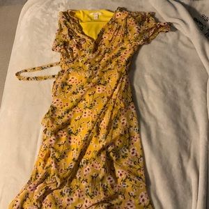 Tie dress. Short with a longer train